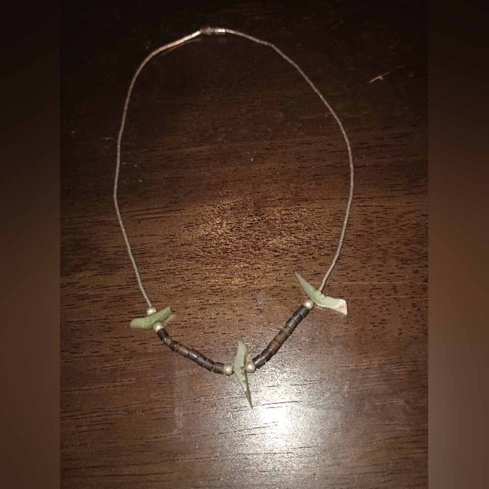 Vintage liquid silver bird fetish necklace